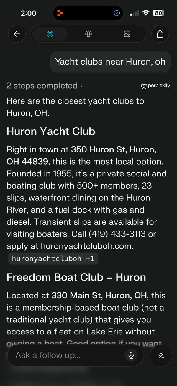 Perplexity mobile screenshot citing Huron Yacht Club at 350 Huron St, Huron, OH 44839, founded 1955, 500+ members, 23 slips, with phone number and a link to huronyachtcluboh.com